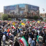 Protesters Carry Iranian Flags Outside White House in Opposition to War with Iran